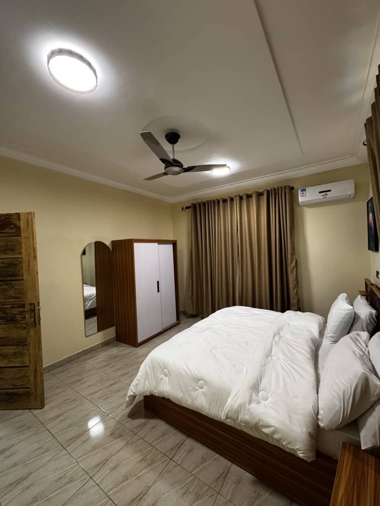 Premium bedroom interior with warm luxury accents